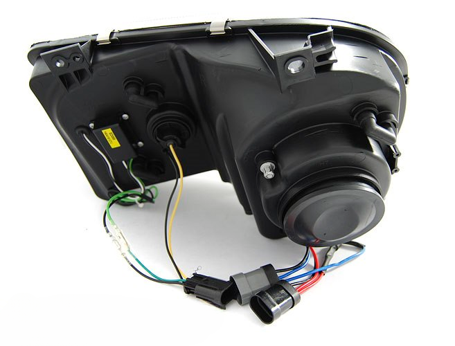 ART.5562 FARI ANTERIORI CHRYSLER 300C 05-10 NERO