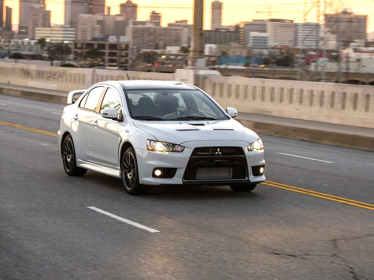 ART.4062 PARAURTI ANTERIORI MITSUBISHI LANCER 09-15 SEDAN EVO STYLE (Copia)