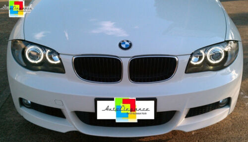 BMW SERIE 1 E81 E82 E87 E88 04-11 FARI NERI CON ANELLI ANGEL EYES LED BIANCHI AUTOELEGANCERICAMBI