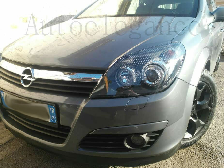 OPEL ASTRA H 2004-2007 FARI NERI CON ANELLI ANGEL EYES LED BIANCHI