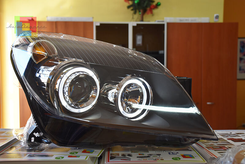 OPEL ASTRA H 2004-2007 FARI NERI CON ANELLI ANGEL EYES LED BIANCHI