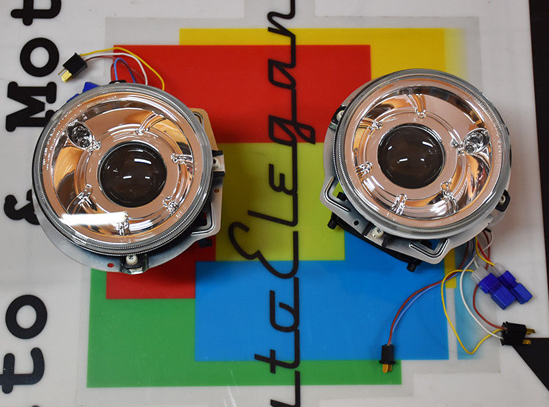 MERCEDES CLASSE G W463 W461 1990-2012 FARI ANTERIORI LENTICOLARI FANALI CROMATI