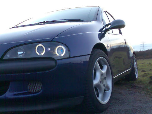 FARI ANGEL EYES BIANCHI OPEL TIGRA 1994-2000 FANALI SPORTIVI NERI H1 / H1