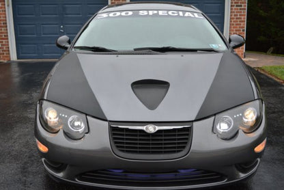 ART.5554 FARI ANTERIORI CHRYSLER 300 M 99-04 ANGEL EYES BLACK