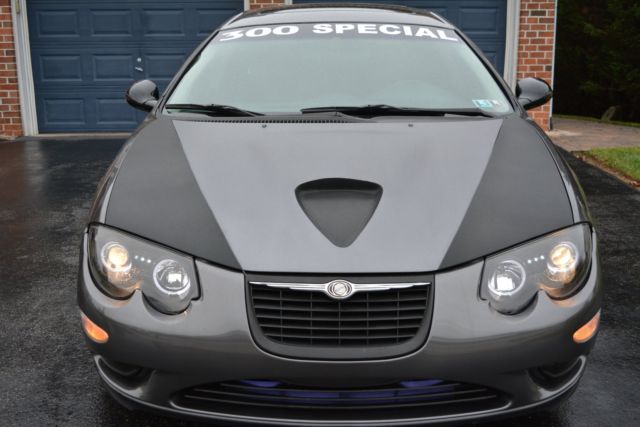 ART.5555 FARI ANTERIORI  CHRYSLER 300 M 99-04 ANGEL EYES CHROME