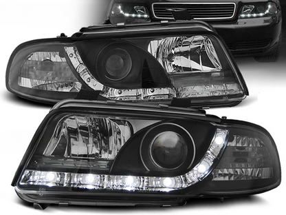 FARI ANTERIORI DAYLIGHT NERO ADATTI COMPATIBILI PER AUDI A4 11.94-12.98