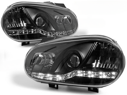 FARI ANTERIORI DAYLIGHT NERO per VW GOLF 4 09.97-09.03
