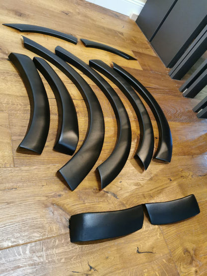 🔥1551 PARAFANGHI ALLARGATI ADATTI PER VW CADDY MK3 2015-2020 LOOK NERO OPACO🔥