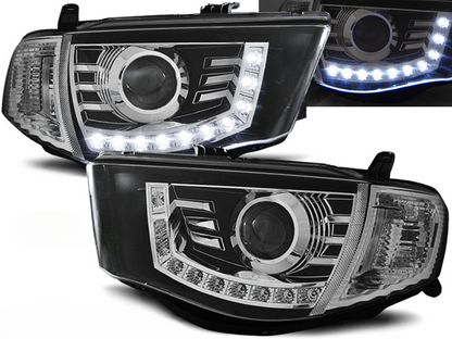 FARI ADATTI PER MITSUBISHI L200 06-10 NERO LUCE DIURNA