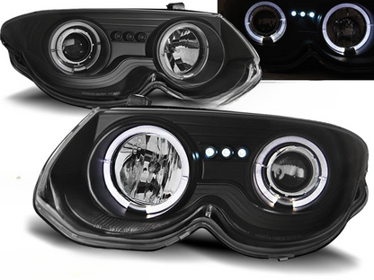 ART.5554 FARI ANTERIORI CHRYSLER 300 M 99-04 ANGEL EYES BLACK