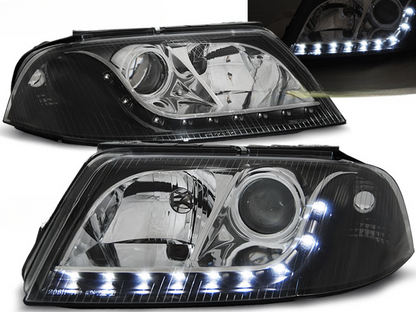 FARI ANTERIORI DAYLIGHT NERO per VW PASSAT 3BG B5 FL 09.00-03.05