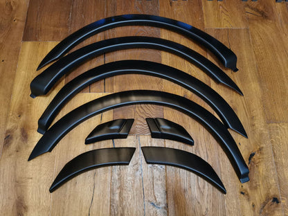 PARAFANGHI ALLARGATI ADATTI PER FORD TRANSIT MK3 FL 2006-2012 LOOK NERO OPACO