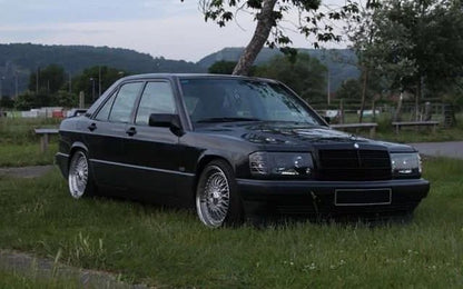 FARI ANTERIORI ADATTI PER MERCEDES 190 W201 1982-1993 LOOK NERI DESIGN SPORTIVI