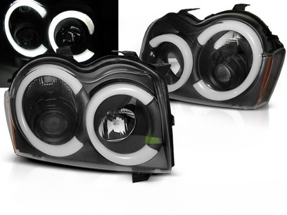 ART.5571 FARI ANTERIORI JEEP GRAND CHEROKEE 05-08 LUCE TUBARE NERA