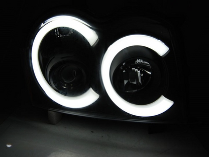 ART.5571 FARI ANTERIORI JEEP GRAND CHEROKEE 05-08 LUCE TUBARE NERA