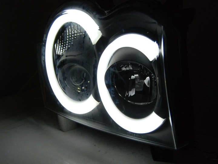 ART.5571 FARI ANTERIORI JEEP GRAND CHEROKEE 05-08 LUCE TUBARE NERA