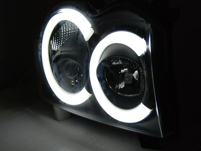 ART.5571 FARI ANTERIORI JEEP GRAND CHEROKEE 05-08 LUCE TUBARE NERA
