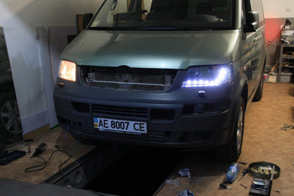FARI ANTERIORI PER VW T5 2003-2009 FONDO NERO