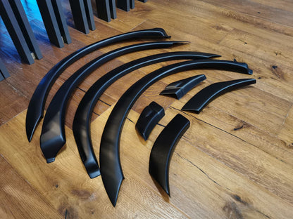 PARAFANGHI ALLARGATI ADATTI PER FORD TRANSIT MK3 FL 2006-2012 LOOK NERO OPACO