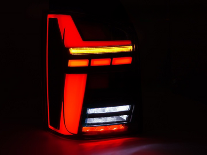 💫ART.5927 FARI POSTERIORI A BARRA LED FUME' SEQ per VW T5 2010-2015💫