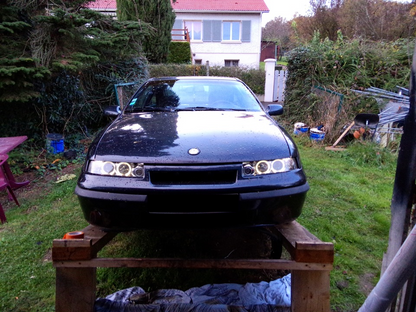 💫ART.6153 FARI ANTERIORI per OPEL CALIBRA 09.90-06.97 OCCHI D'ANGELO CROMATI💫