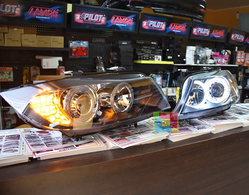 Coppia fari adatti per bmw e90 e91 angel eyes led bianchi con freccia led