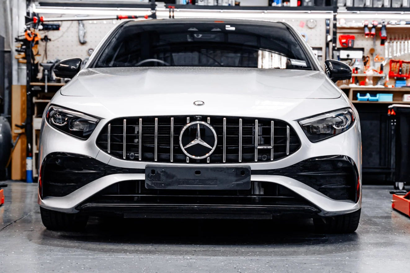 PARAURTI PER MERCEDES-BENZ CLASSE A W177 2024+ LOOK AMG A45S + GRIGLIA CROMATA
