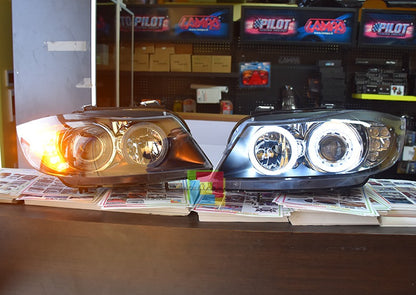Coppia fari adatti per bmw e90 e91 angel eyes led bianchi con freccia led