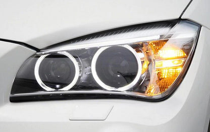 🔥BMW X1 E84 FARI ANTERIORI ANGEL EYES LED H7 LENTICOLARI xenon look🔥