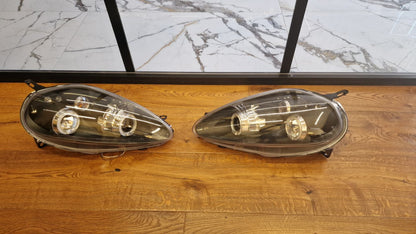ART.2159 FARI ANTERIORI FIAT GRANDE PUNTO 2005-2008 NERI ANGEL EYES