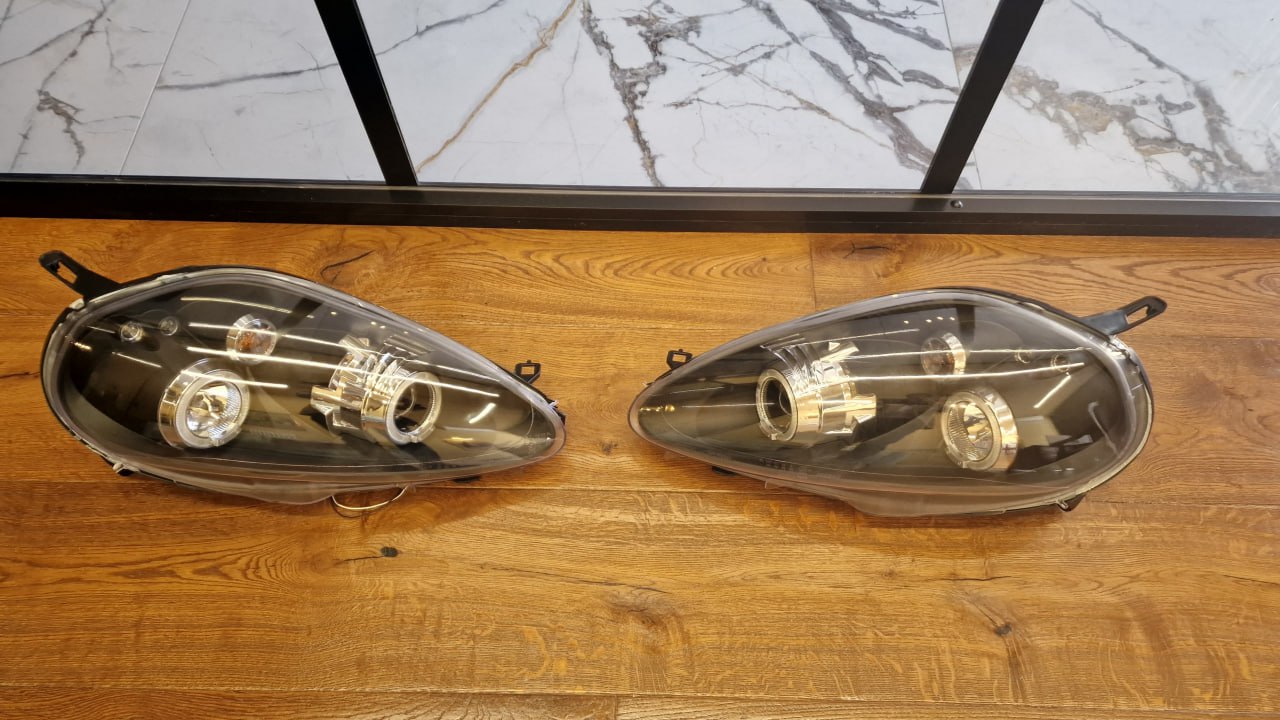 ART.2159 FARI ANTERIORI FIAT GRANDE PUNTO 2005-2008 NERI ANGEL EYES