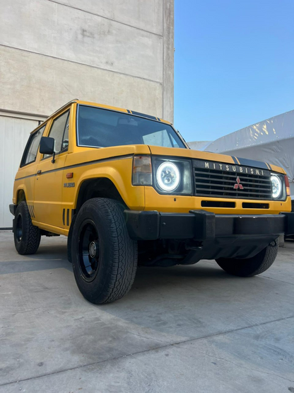 ART. 0030 FARI TONDI ANTERIORI MITSUBISH PAJERO L04G