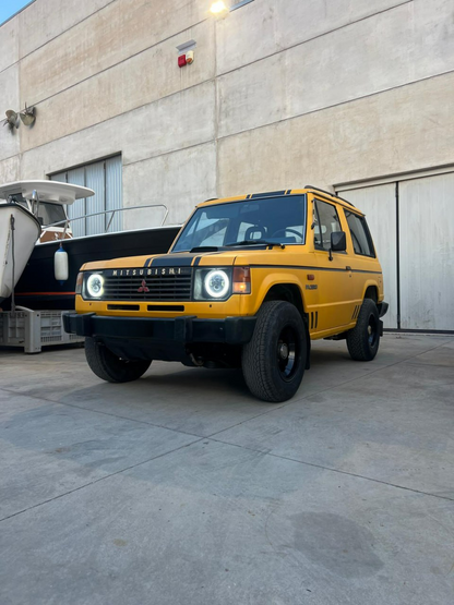 ART. 0030 FARI TONDI ANTERIORI MITSUBISH PAJERO L04G