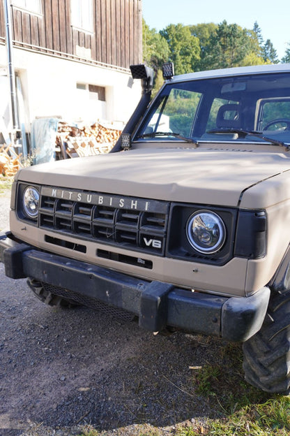 ART. 0030 FARI TONDI ANTERIORI DRL 7 Mitsubishi Pajero
