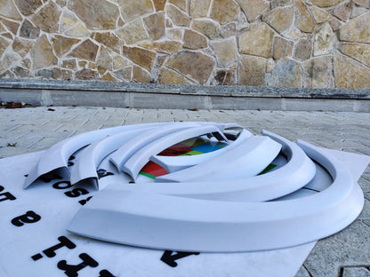 ART.3021 Parafanghi mercedes ML w164 kit 8 pezzi vetroresina