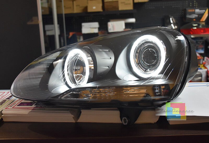 ART. 0377 FARI ANTERIORI VW GOLF 5 NERI ANGEL EYES