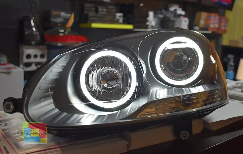 🔥FARI ANTERIORI ADATTI A VW GOLF 5 V 03-08  NERI ANGEL EYES BIANCHI A LED🔥