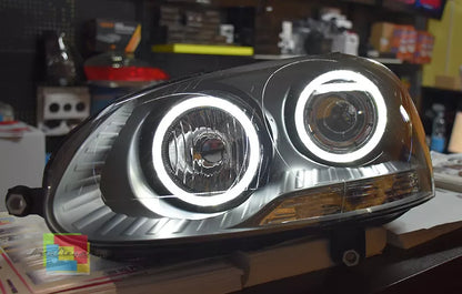 🔥FARI ANTERIORI ADATTI A VW GOLF 5 V 03-08  NERI ANGEL EYES BIANCHI A LED🔥