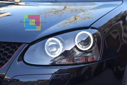 🔥FARI ANTERIORI ADATTI A VW GOLF 5 V 03-08  NERI ANGEL EYES BIANCHI A LED🔥