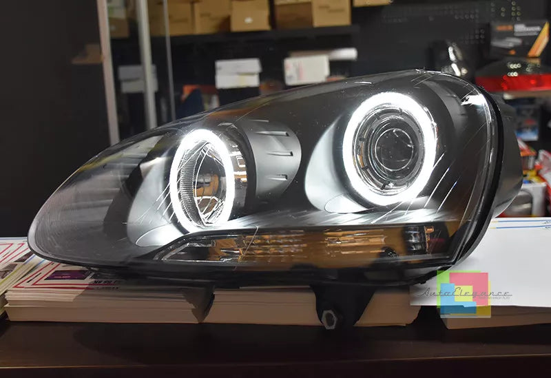 🔥FARI ANTERIORI ADATTI A VW GOLF 5 V 03-08  NERI ANGEL EYES BIANCHI A LED🔥