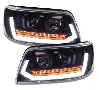 Fari TFL nero con frecce dinamiche adatti per VW T5 Bus 03-09