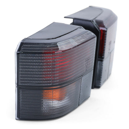 Pair of Black Smoke Rear Lights aftermarket compatible with VW T4 Bus Transporter Caravelle 90-03 