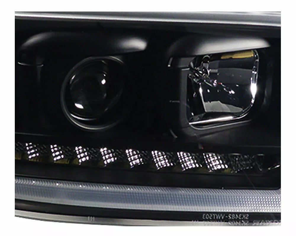 Fari TFL nero con frecce dinamiche adatti per VW T5 Bus 03-09
