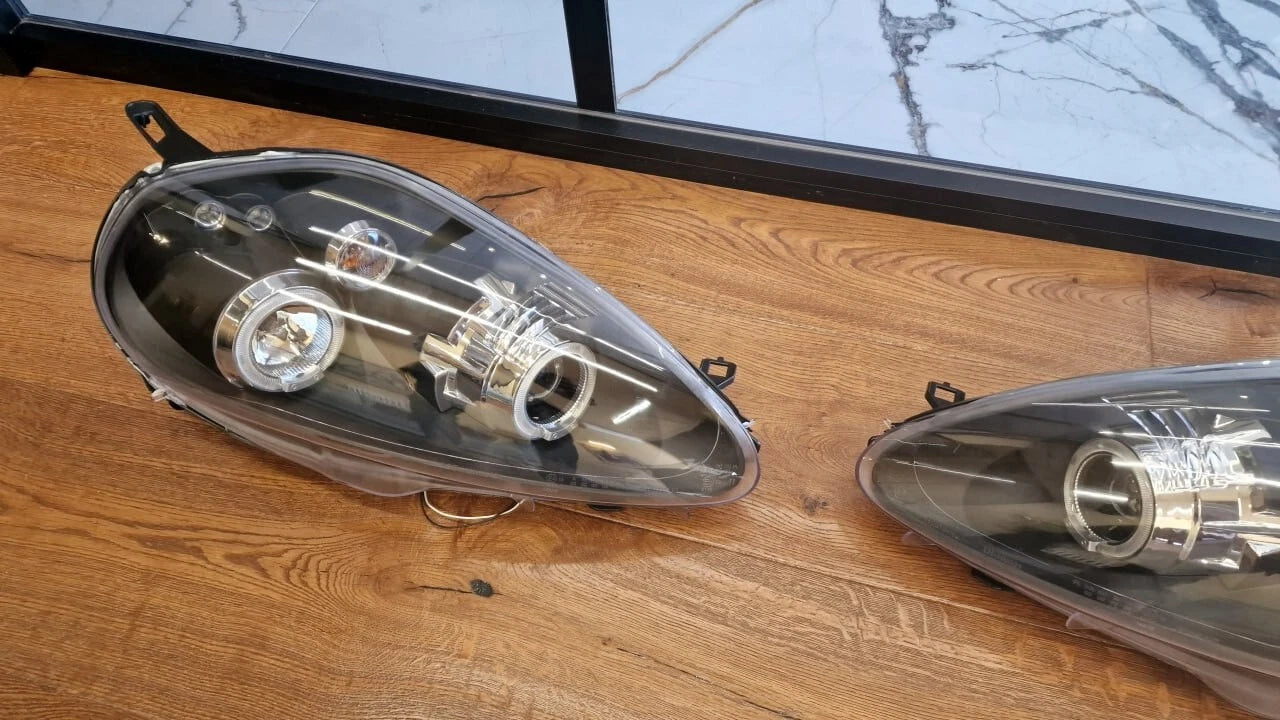 🔥ART.2159 FARI ANTERIORI GRANDE PUNTO 2005-2008 NERI ANGEL EYES🔥