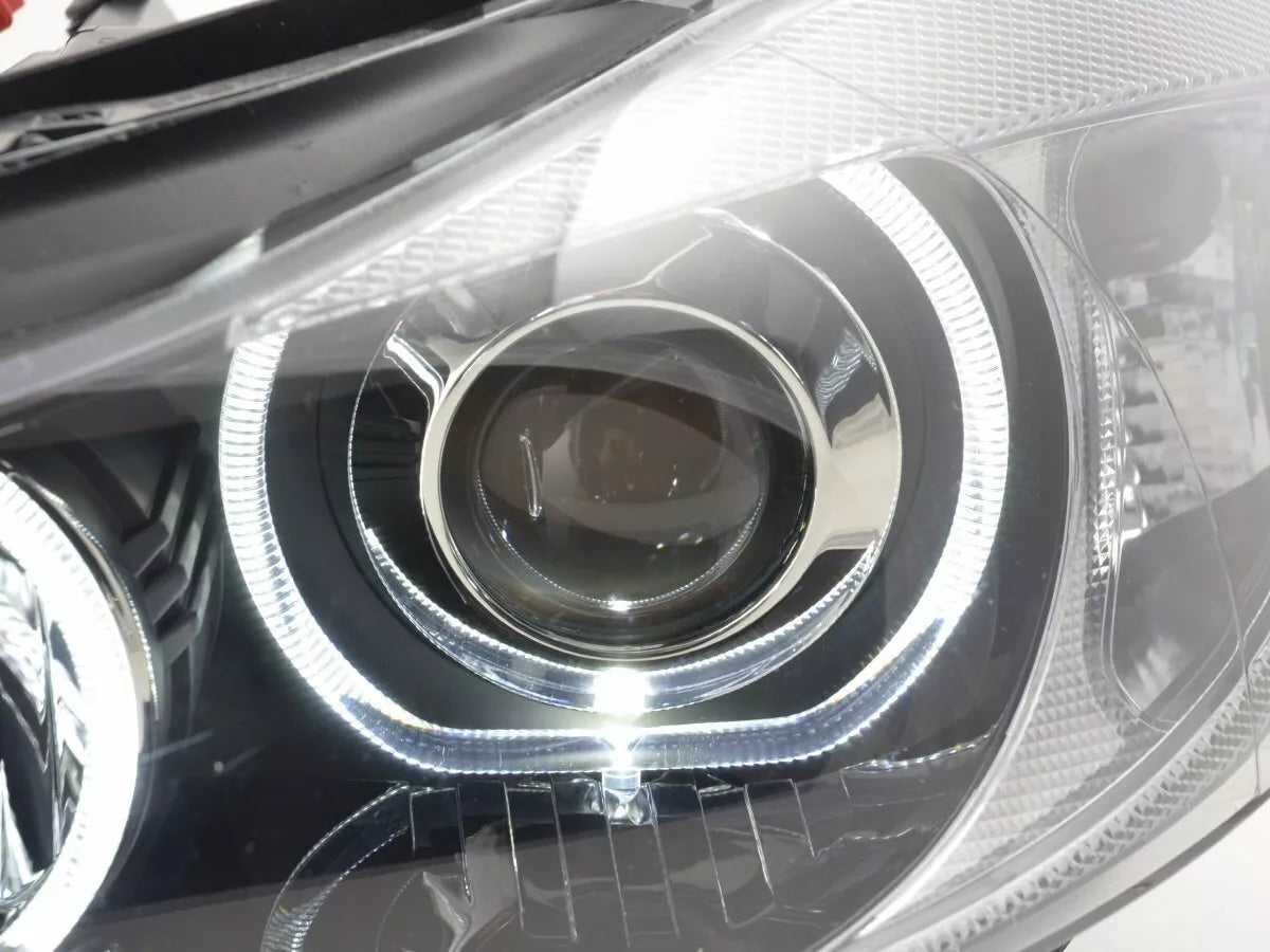 Set fari per BMW E90 E91 anno 05-08 LED nero bianco anelli angel eyes