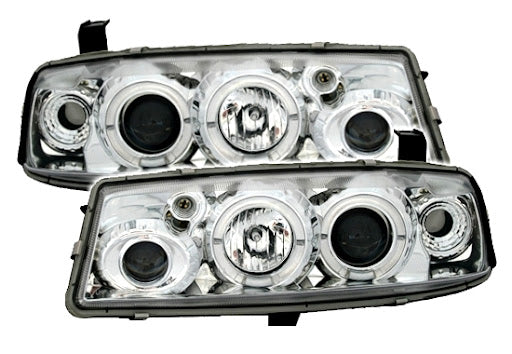 💫ART.6153 FARI ANTERIORI per OPEL CALIBRA 09.90-06.97 OCCHI D'ANGELO CROMATI💫