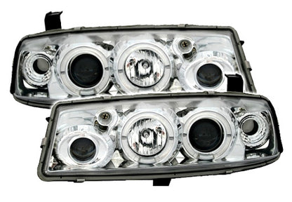 💫ART.6153 FARI ANTERIORI per OPEL CALIBRA 09.90-06.97 OCCHI D'ANGELO CROMATI💫