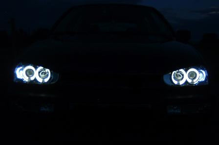 SEAT LEON 1999-2005 FARI ANTERIORI NERI ANGEL EYES LENTICOLARI H1 / H1