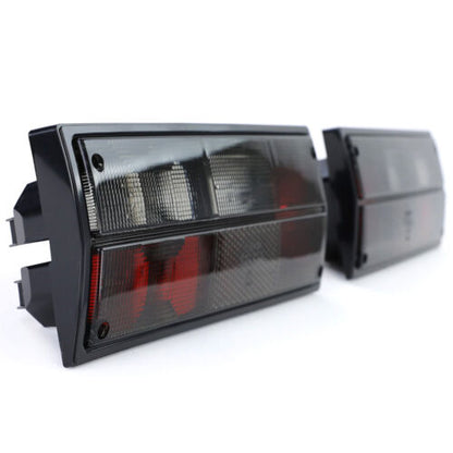 Coppia fanali posteriori nero fumè per VW Bus Box Transporter T3 79-92 AUTOELEGANCERICAMBI