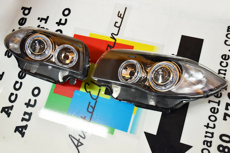 FARI NERI CON ANELLI ANGEL EYES BMW SERIE 1 E81 E82 E87 E88 04-11 LED BIANCHI